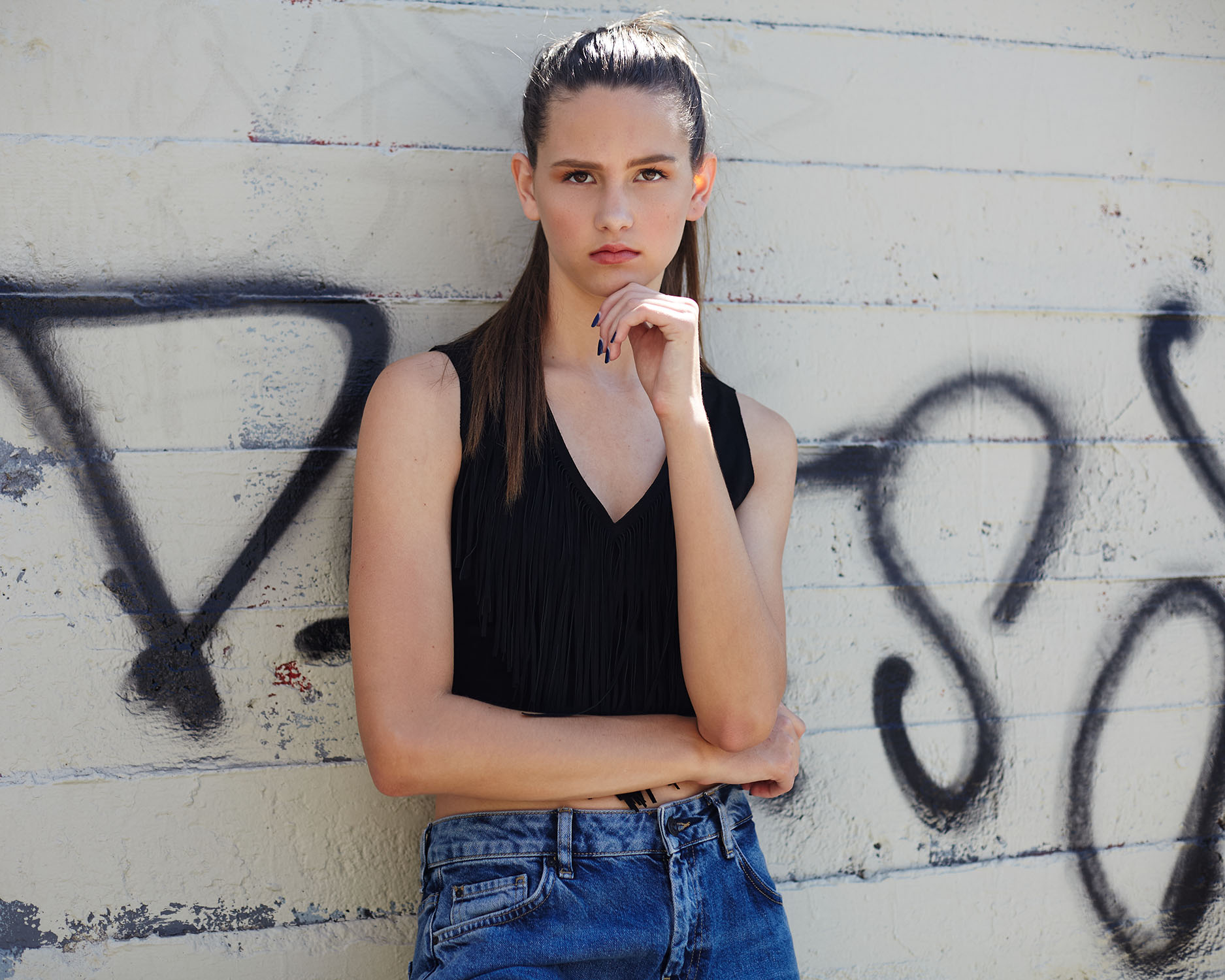 Environmental portrait of a Wilhelmina model against a graffiti wall in San Diego — Headshots by Guffy, San Diego