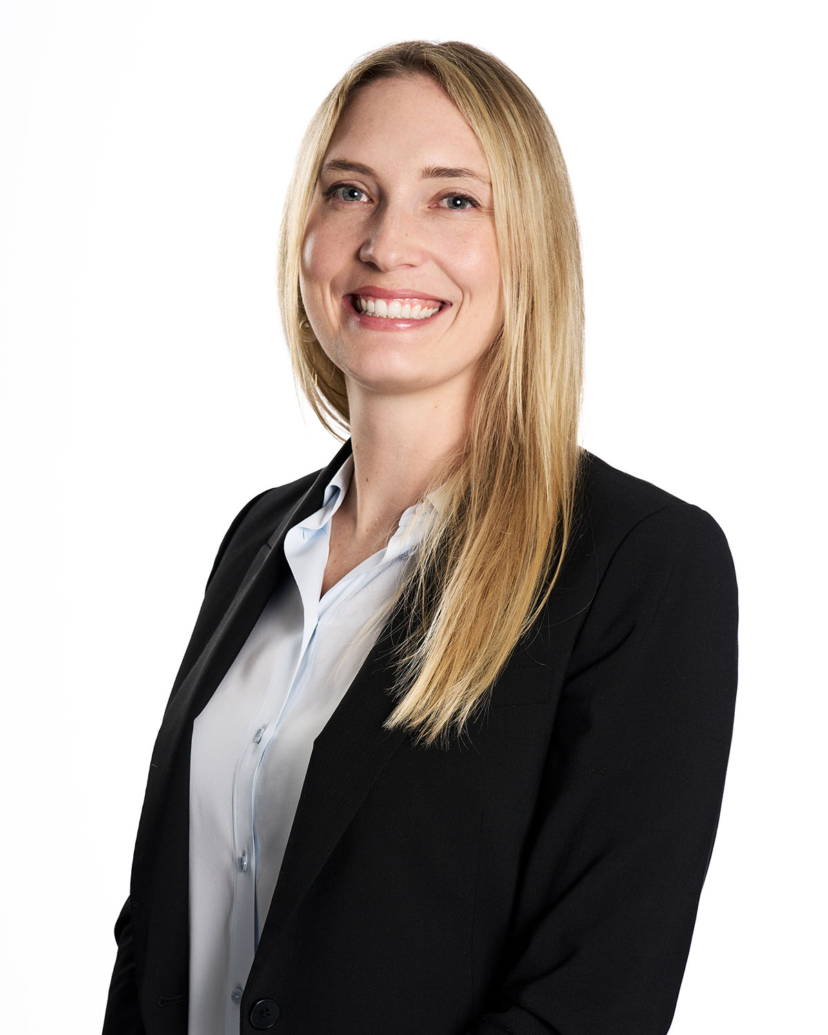 Professional headshot of a woman with blonde hair and a bright smile against a white background — Headshots by Guffy, San Diego